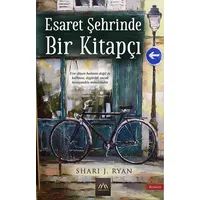 Esaret Şehrinde Bir Kitapçı - Shari J. Ryan - Arkadya Yayınları