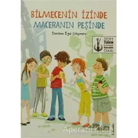 Bilmecenin İzinde Maceranın Peşinde - Dursun Ege Göçmen - Tudem Yayınları